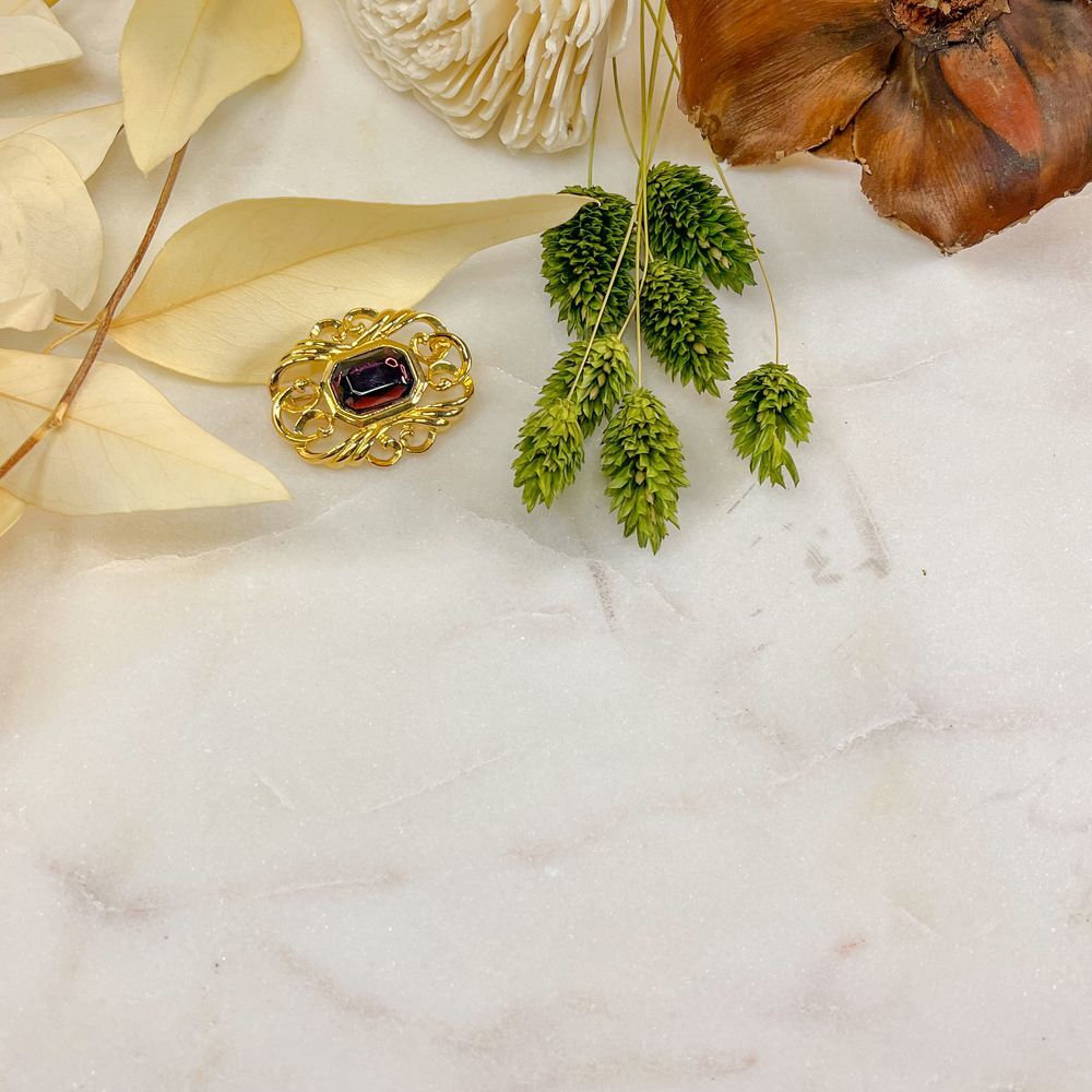 Gold Plated Brooch with Amethyst Colored Center Stone